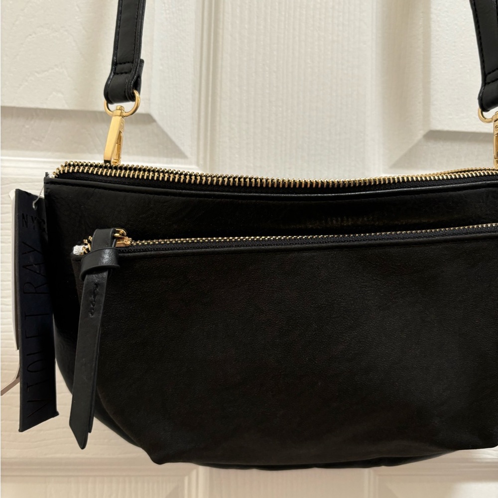 NWT black cross body two pocket bag.
